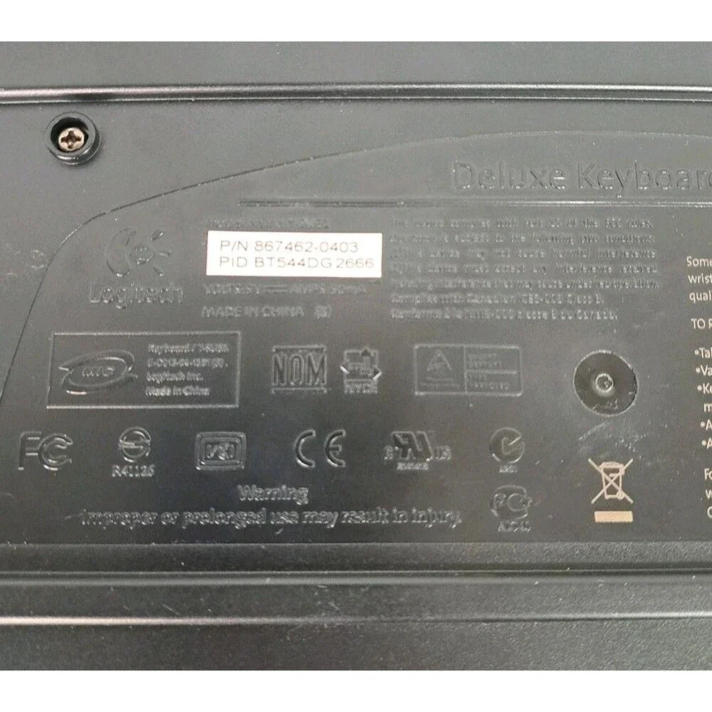 Logitech Wired Deluxe Keyboard Y-SU61 Black PS/2 Purple Connector PN 867462-0403